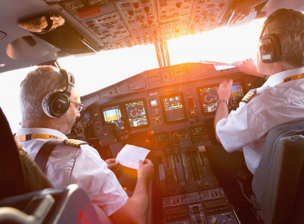 Pilot in an ATR turboprop cockpit